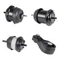 Four automotive suspension components on a white background