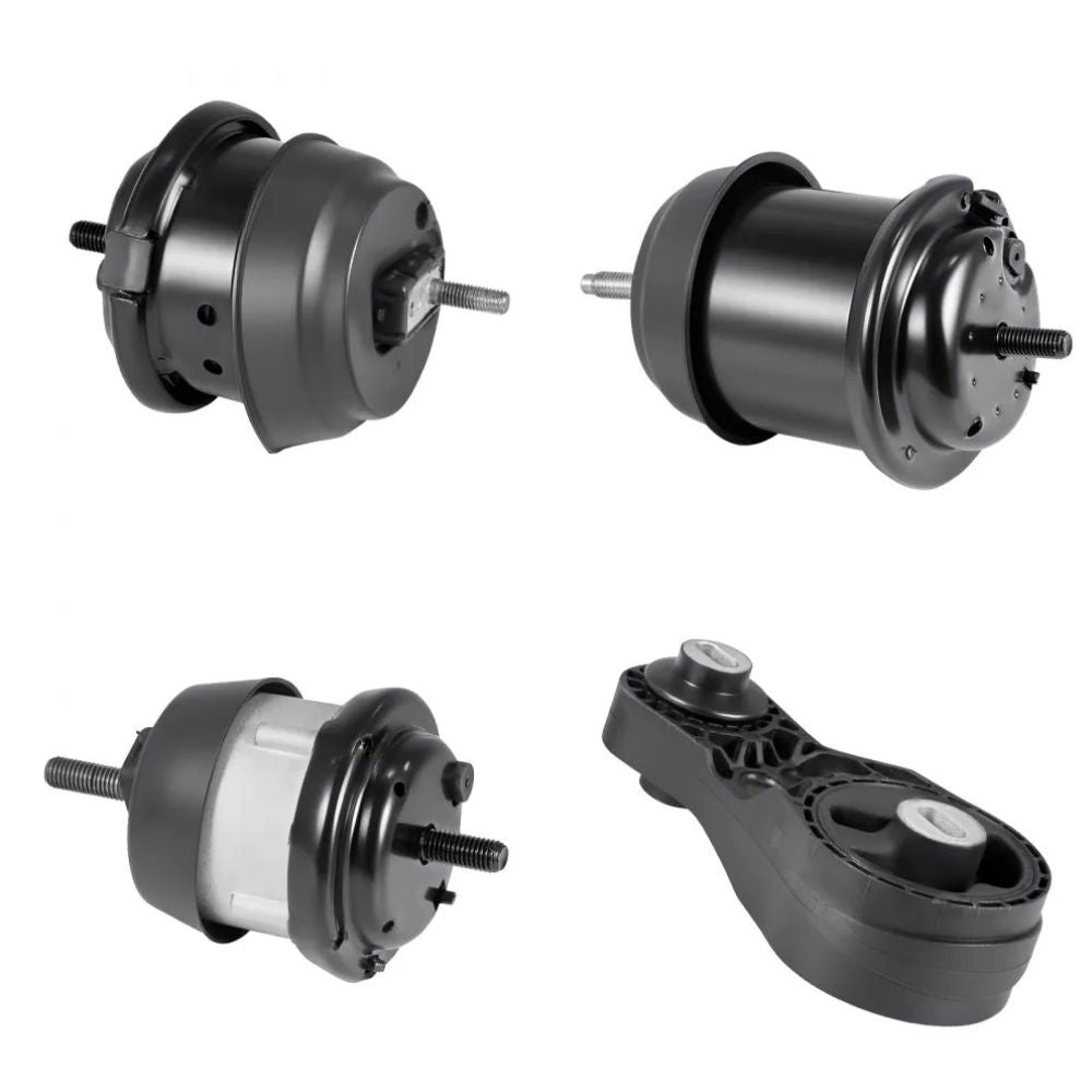 Four automotive suspension components on a white background