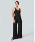 Breezeful backless resort jumper with side invisible zipper pockets and wide legs