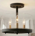 Quoizel Whitlock 12-in Matte Black and Brushed Weathered Brass Indoor 3 -Light Semi-flush Mount Light with Clear Glass